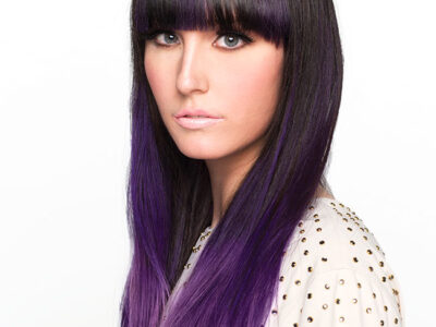 model with long purple hair extensions highlights