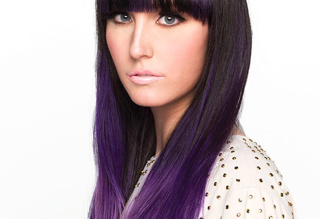 model with long purple hair extensions highlights